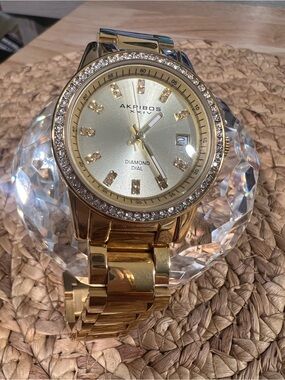 Akribos XXIV Gold Tone Crystal Bezel Women's Watch